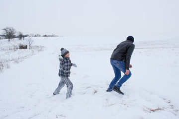 Fototapeta na wymiar snowball games in the winter