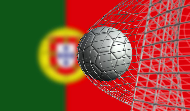 Soccer ball scores a goal in a net against Portugal flag. 3D Rendering