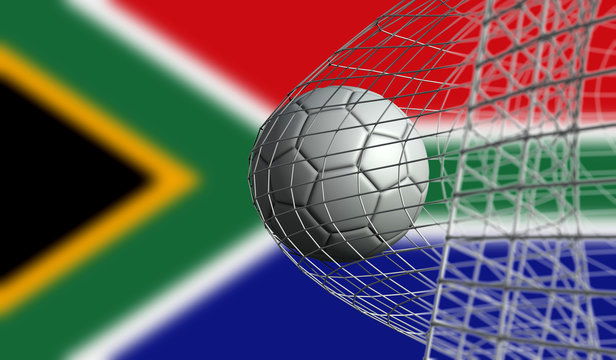 Soccer ball scores a goal in a net against South Africa flag. 3D Rendering