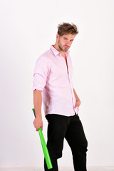 Baseball training and sport tool concept. Guy in pink shirt