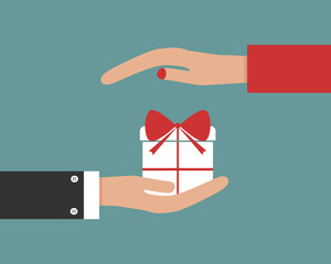 Giving gift concept with male and female hands and gift box