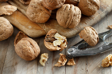 Fresh walnuts on an old wooden table