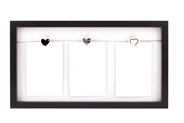 Wooden picture frame with three photos, isolated on white with clipping path