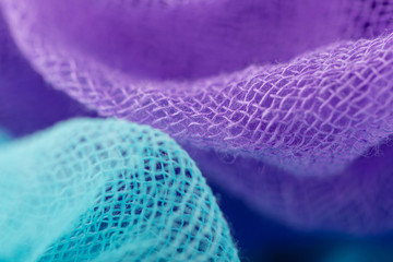 Closeup of hand dyed gauze fabric purple and blue color