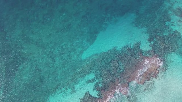 Crystalline sea and earth rotation aerial view from drone