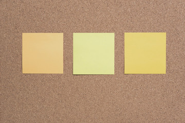 Fototapeta premium sticky note or post is on cork bulletin billboard.
