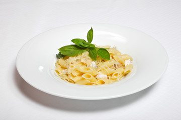 pasta with cheese sauce on white