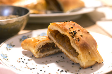 traditional arabic empanadas with onion,tomato,cheese 