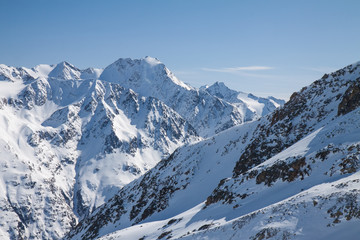 Fototapeta na wymiar Winter snow covered mountain peaks Austrian alps