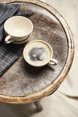 Empty and filled coffee cups