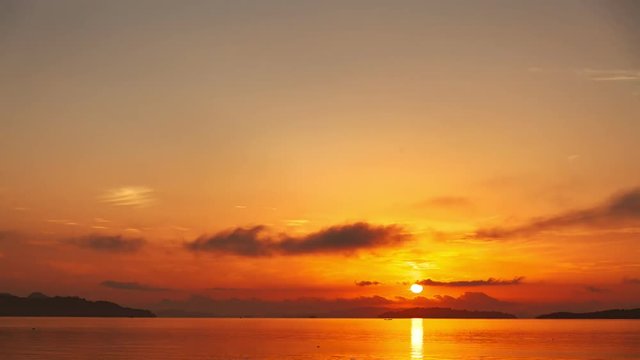 4k timelapse of beautiful sunlight and clouds crossing the sky over the sea sunrise or sunset evening time 