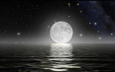 Moon rising over the ocean with starry sky in the background