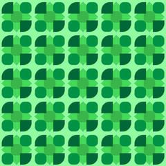 abstract green background for graphic design from geometric shapes of various shapes and green hues on a light green background