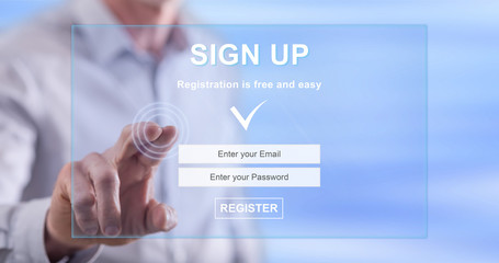 Man touching a signup concept on a touch screen
