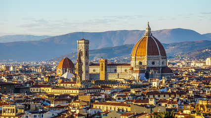 Sun setting over Florence and the Florence Cathedral, Santa Maria del Fiore in Florence, Italy