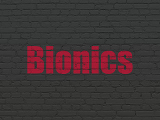 Science concept: Bionics on wall background