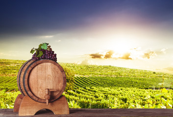 Grapes on wooden barrel