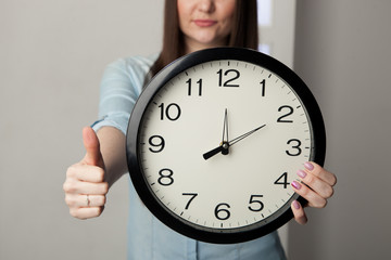 The girl with a clock