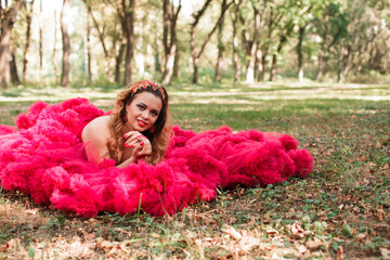 Woman in red cloudy dress