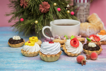 Tasty cookie on a fir-tree background for happy new year holiday