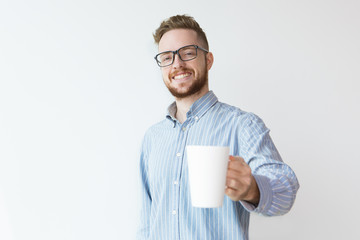Positive Young Man Offering Coffee to Collegue - obrazy, fototapety, plakaty