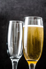 Champagne glasses on black background

