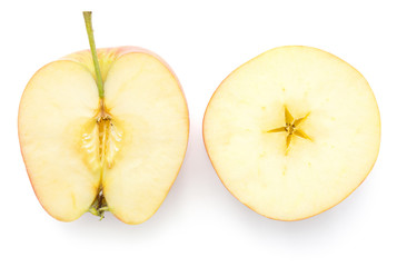 Naklejka na ściany i meble Comparing two apple halves (Evelina variety) top view isolated on white background.
