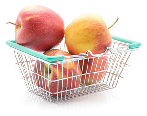 Four apples (Evelina variety) in a shopping basket isolated on white background.
