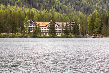 Obraz premium Hotel on Lake Braies in Dolomites, Italy