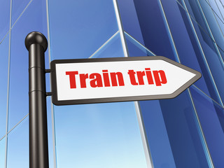 Tourism concept: sign Train Trip on Building background