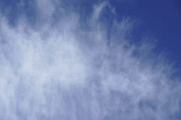 Heavenly blurry clouds blue sky