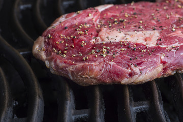 Ground pepper on a steak