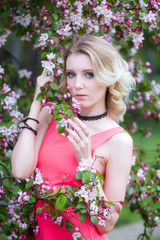 Fototapeta premium Girl spring apple tree
