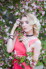 Fototapeta premium Girl spring apple tree