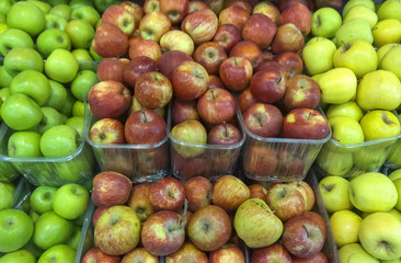 Different sorts of apples on a market place