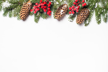 Fototapeta na wymiar Christmas background. with fir tree and decorations on white isolated. Top view copy space.