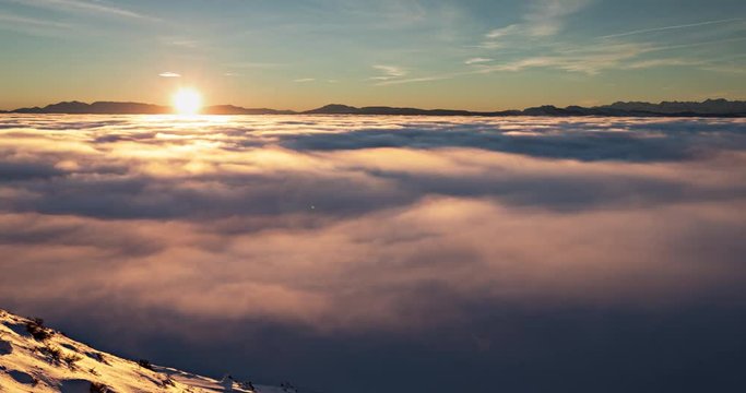Above a layer of clouds in the mountains. Time Lapse