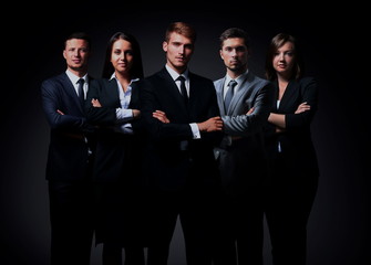Portrait of five business people standing