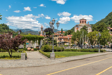 Fototapeta na wymiar View of Laveno Mombello, is the tourism capital of the eastern shore of Lake Maggiore in province of Varese, Italy