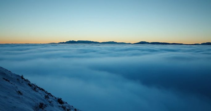 Above a layer of clouds in the mountains. Time Lapse