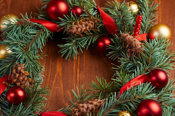 christmas wreath with red and golden balls