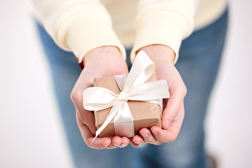 hands holding craft gift box