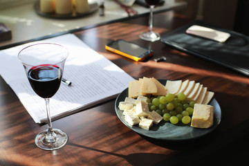 Working situation with a glass of wine