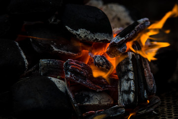 The hot charcoal and fire. Background.