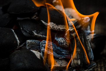 The hot charcoal and fire. Background.