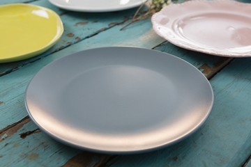 Empty plates on wooden table