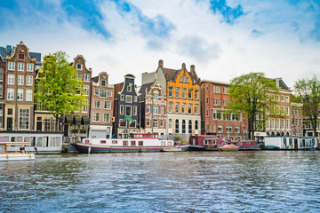 Amsterdam, the Netherlands, September 5, 2017 :typical dutch houses and houseboats. Amsterdam,...