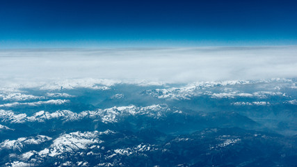 Naklejka na ściany i meble Beautiful aerial landscape view. mountain view from airplane