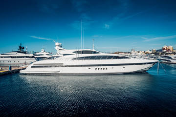 Sailing yachts and private boats at pier in Sochi seaport. yachts in the Bay at the seaport in Sochi city center. RUSSIA