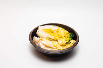 Cabbage for kimchi isolated on crock head 